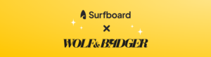 Surfboard and wolf and badger logos