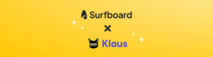 Surfboard & Klaus partnership announcement with both logos on a yellow background